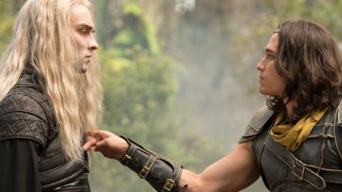 A man with long white hair stands off with an armoured man with short brown hair, a demon and Monkey.