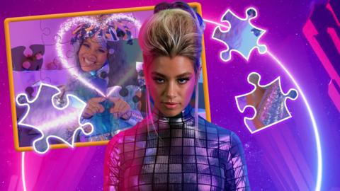 Nova Jones jigsaw puzzle game, image of Nova Jones standing in front of one of the jigsaw puzzles.