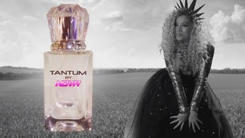 Nova Jones models with her new brand of perfume known as Tantum.