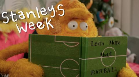 Stanley learns about football