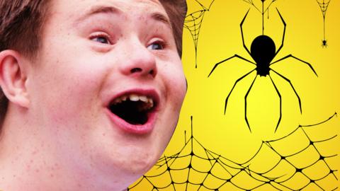 Finn from the Dumping Ground looking at a spider.