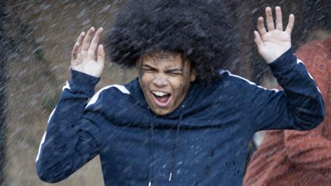 Jay from The Dumping Ground running from something.