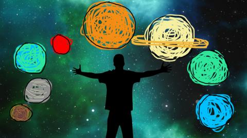 A man standing surrounded by the planets