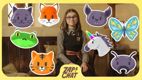 A girl looking happy. Animal emojis surround her. Clarice from The Worst Witch.
