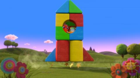 MeMo and BaBa inside a rocket made from building blocks, taking off into the sky!