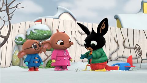 Nicky, Sula and Bing are in the garden playing in the snow