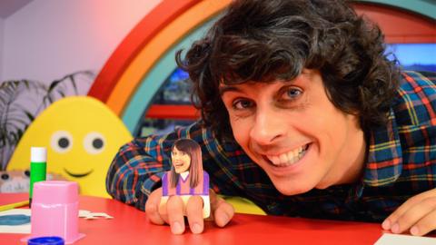 Andy with a footie friend make