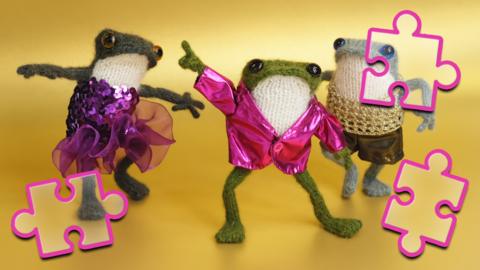 Image of three frog puppets in sparkly disco outfits dancing against a yellow background.