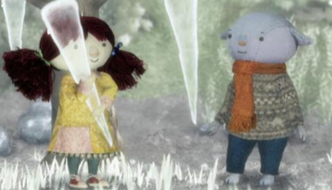 Teal holding an icicle looking at Abney