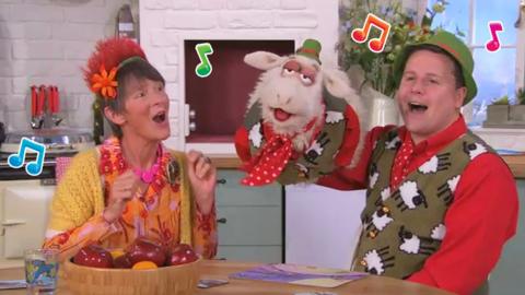 Miss Smiley singing with Bertie Beep and his sheep.