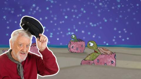 Jack from Old Jack's Boat in front of some baby turtles hatching on a beach.