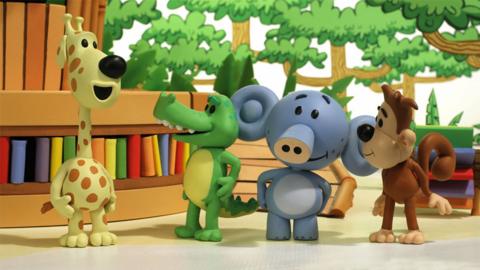 Topsy from Raa Raa the Noisy Lion roaring while Crocky, Huffty and Ooo Ooo look on.