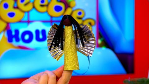 Make your own Christmas Fairy with Evie in the CBeebies House.