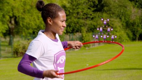 Rachel show us how to do the very exciting hula hoop race.