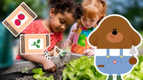 Hey Duggee with a trowel, in front of two children sewing seeds in a raised bed.