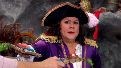 Captain Captain holding a controler