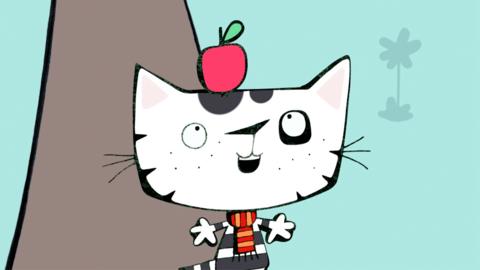 Wussywat The Clumsy Cat with an apple on his head