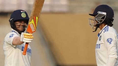 Deepti Sharma raises her bat