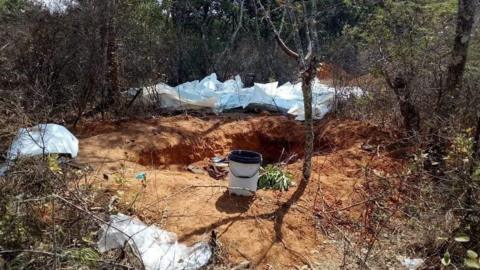 An aerial picture of the mass grave