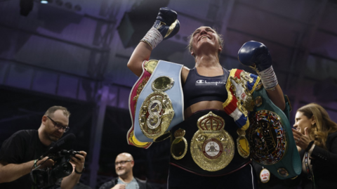 Ellie Scotney with all her belts