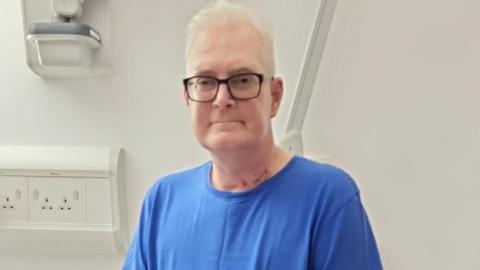 Darren White, 53, from Stockton-on-Tees, who is one of the first lung transplant patients in the UK to have a patch of their organ donors skin grafted onto their forearm in the hope that it could help medics spot signs of the lung being rejected by the body sooner.
