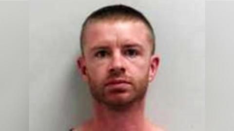 Mug shot of Kristopher Purvis - only his face and neck can be seen. He has light brown or ginger coloured hair and a beard, cut short. He has a neutral expression.