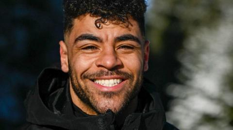 British bobsleigher Taylor Lawrence, smiling