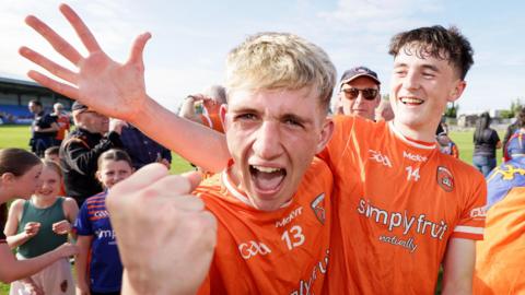 Armagh's Fionn Toale celebrates after the game with Eoin Duffy