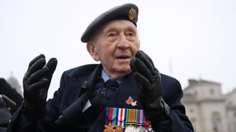 Joe Randall in an RAF beret and blazer with medals attached 