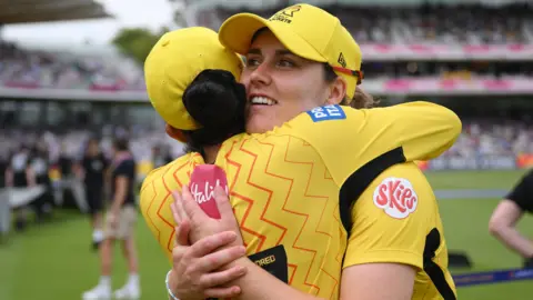 Trent Rockets players celebrate winning the women's Hundred title