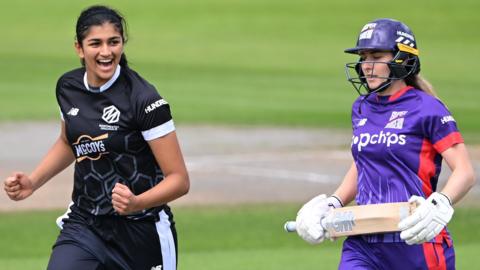 Mahika Gaur celebrating after taking the wicket of Marie Kelly