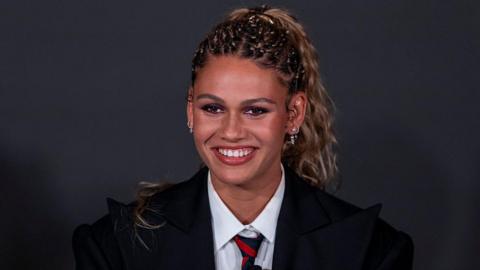 Trinity Rodman re-signing with her club team Washington Spirit on 22 January 2026