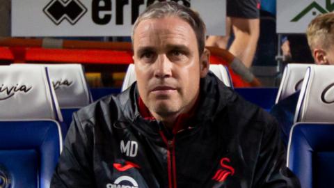 Michael Duff watches Swansea at QPR