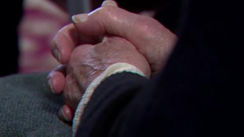 Hands of pensioner burglary victim in Derry