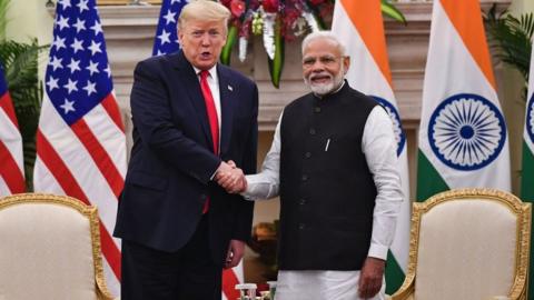 India's Prime Minister Narendra Modi (R) and US President Donald Trump at Hyderabad House in New Delhi on February 25, 2020.