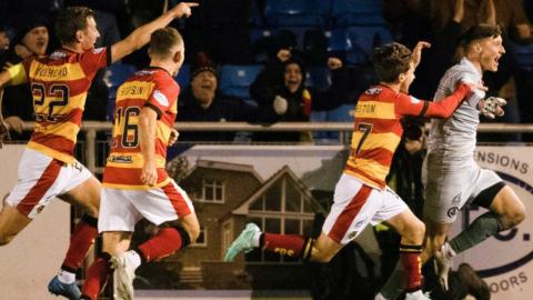 Partick Thistle celebrate their late equaliser