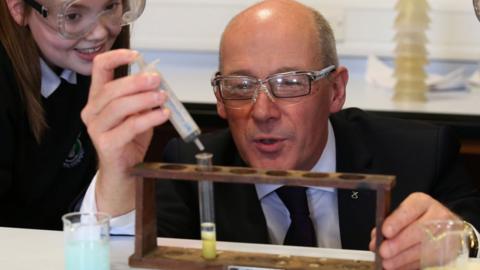 John Swinney in science classroom