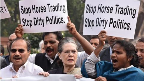 Indian congress lawmakers including their president Sonia Gandhi (C) protest against the Bhartya Janta Party (BJP) at the parliament house in New Delhi, India, 25 November 2019