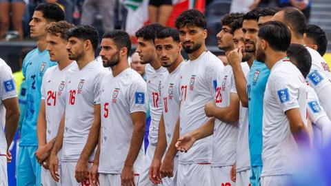 Iran players during the national anthem
