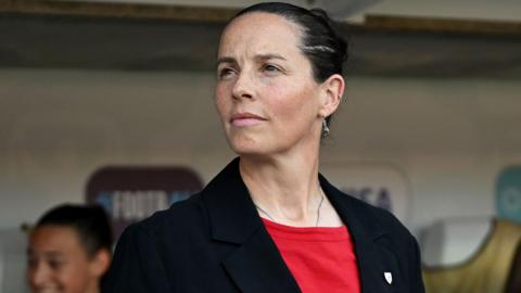 Rhian Wilkinson on the touchline 