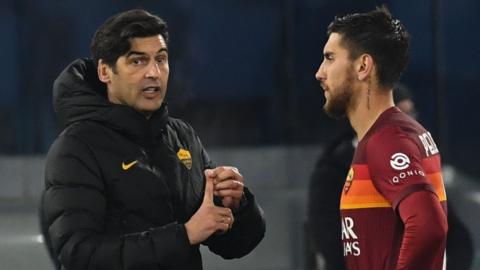 Paulo Fonseca head coach of Roma gives instruction to Lorenzo Pellegrini