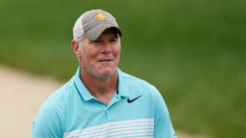 Brett Favre walking during a celebrity golf event in 2022