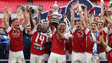 Arsenal's players celebrate winning the FA Cup