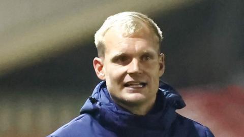 Liam Manning on the touchline for Oxford United