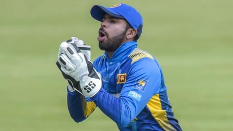 Sri Lanka wicketkeeper Niroshan Dickwella takes a catch during an ODI