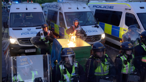 Screen grab taken from PA Video of police and protestors clashing in Southampton during a protest following the death of Henry Nowak. Vickrum Digwa was jailed at Southampton Crown Court for life with a minimum term of 21 years for the murder of 18-year-old student Henry Nowak.