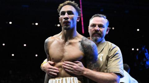 Ben Whittaker held back by Andy Lee