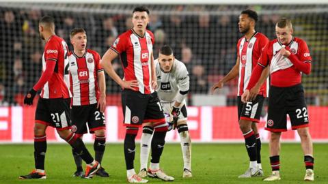 Sheffield United players look dejected