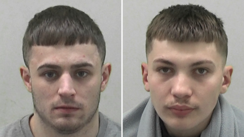 Mugshots of Thompson and Jahelezi. Thompson has stubble and short dark hair cut in a straight line at the fringe. Jahelezi has a very faint moustache and short brown hair.