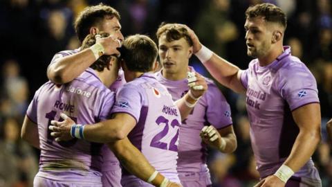 Scotland's Kyle Rowe (L) is congratulated by team mates after scoring the ninth try during a Quilter Nations Series match between Scotland and the USA at Scottish Gas Murrayfield, on November 01, 2025